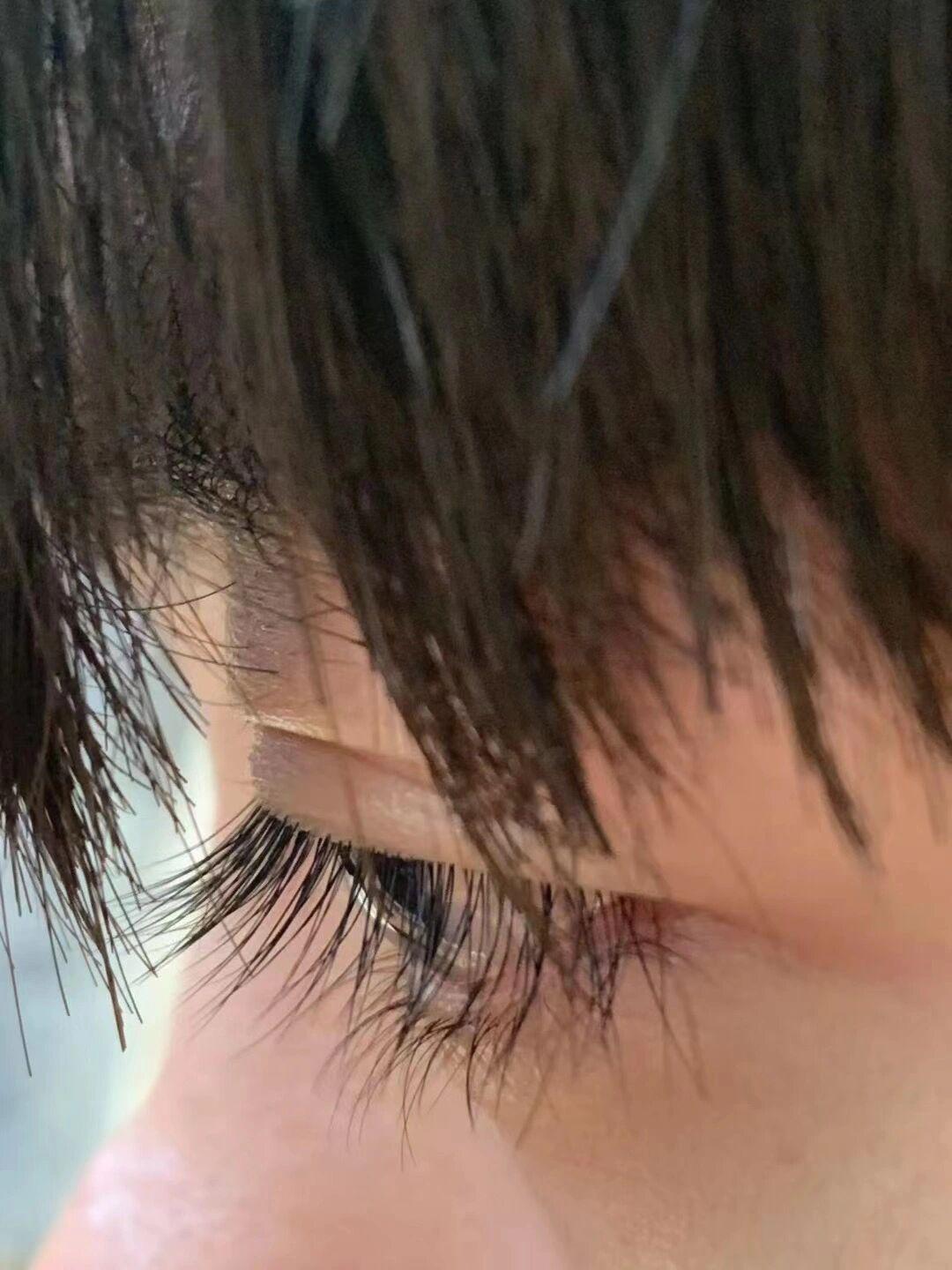 What does a boys long eyelashes represent(pic2)